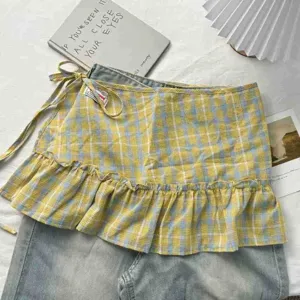 Plaid ruffled skirt layering piece, high-waisted vintage preppy style mini skirt extender for women.