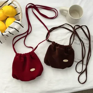 Retro velvet drawstring bucket bag, chic french crossbody phone pouch for autumn winter.
