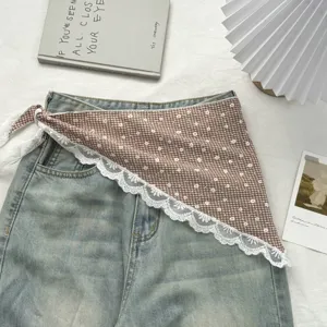 Close-up of French sweet lace checkered triangle scarf, pastoral style waist wrap detail view.