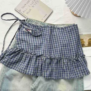 Plaid layered ruffle skirt extender, vintage high waist A-line cake mini skirt detail.