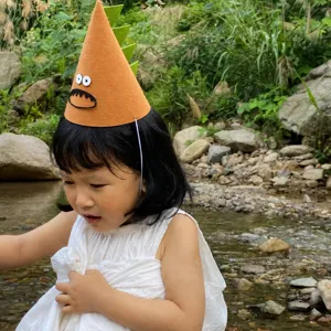 Simpatico cappello conico di dinosauro per feste di compleanno, copricapo in feltro.