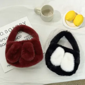 Cute fluffy rabbit ear plush handbag for women, winter mini furry top handle tote bag style.