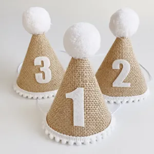 Burlap birthday hat detail, Nordic minimalist style, cute white pom pom and felt number 1