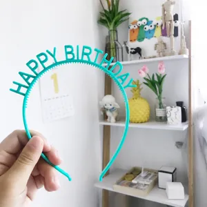 Green plastic happy birthday headband for party hair accessories children and adults.