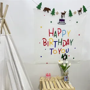 Forest style birthday party backdrop with cute bear and deer patterns for kids celebrations.