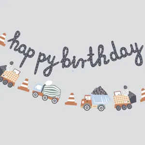 Detailed view of the cute construction vehicle birthday banner with letter print for kids party.