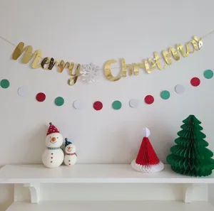 Gold Christmas letter banner garland with snowmen and tree decor for holiday party.