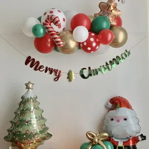 Christmas balloon garland arch kit with Merry Christmas banner for holiday party decor.