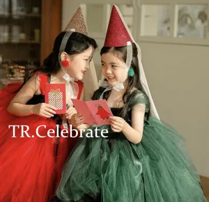 Glitter cone birthday hat with veil for kids party, festive Christmas holiday dress up supplies.