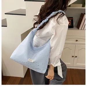 Light blue star pattern canvas shoulder bag with ruffled strap, casual large capacity tote.