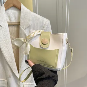 Chic contrast color bucket bag for women, trendy niche shoulder crossbody bag with scarf decor.