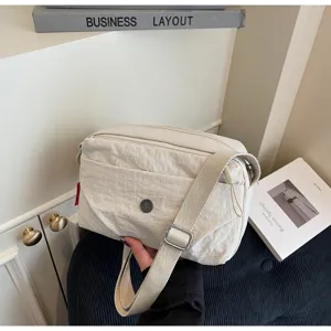 Minimalist canvas crossbody shoulder bag for women daily commute casual lightweight.