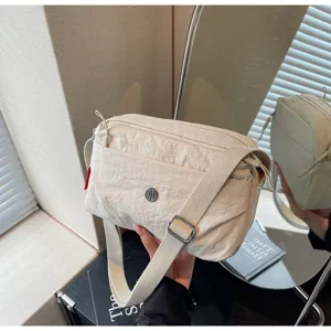 Casual nylon crossbody bag for women, lightweight daily commuter shoulder bag detail.