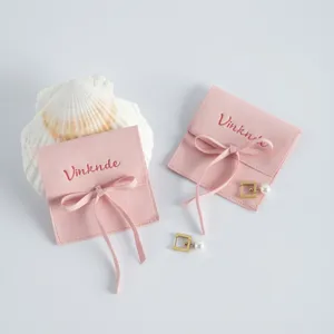 Sacchetto portagioie in camoscio rosa con fiocco, piccola borsa quadrata per anelli orecchini.