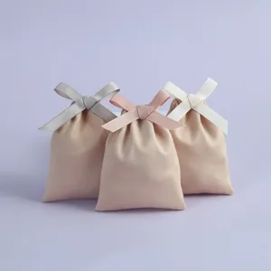 Details zum weichen Wildleder Schmuckbeutel mit Schleife, kleine Kordelzug Geschenktüte.