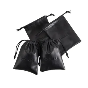 Schwarzer PU-Leder Kordelzug Schmuckbeutel Detailaufnahme, kompakte Aufbewahrung für Accessoires.