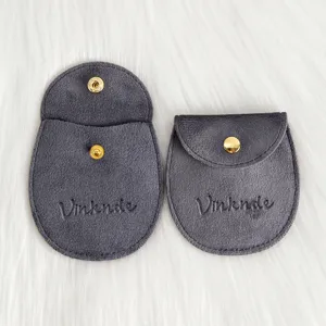 Grauer Samt Schmuckbeutel mit Druckknopf, weiche Aufbewahrungstasche für Geschenke und Accessoires.