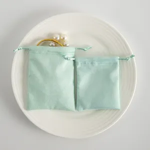Set di sacchetti per gioielli con coulisse in velluto verde menta, morbide borse in flanella.