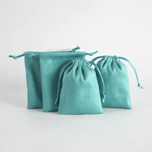 Velvet drawstring pouch for jewelry gift packaging, small items storage bag, teal color.