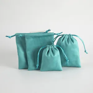 Turquoise velvet drawstring pouches for jewelry packaging, multi-size small gift bags for daily storage.