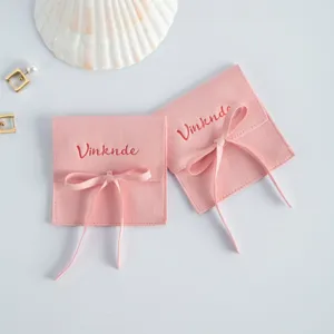 Sacchetto per gioielli in velluto microfibra rosa con fiocco, custodia quadrata per anelli.