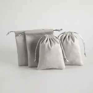 Graue Samt Schmuckbeutel mit Kordelzug für Geschenke, Kopfhörer und Zubehör Aufbewahrung.