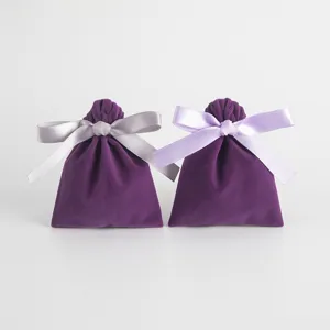 Purple velvet jewelry storage bags with satin ribbon bows for gift packaging wholesale