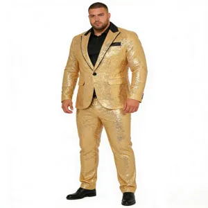 Dettaglio abito con paillettes oro con risvolti neri, tessuto lucido e vestibilità elegante.
