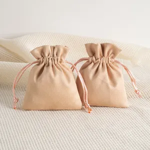 Velvet drawstring pouch detail showing soft texture and fine stitching for jewelry and gift packaging.