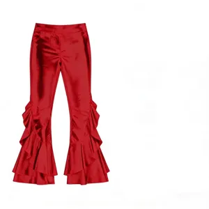 Red shiny metallic flared pants detail showing multi-layered side ruffles and high waist design.