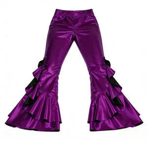 Glossy faux leather flared pants for women with dramatic black ruffle cuffs stage wear.