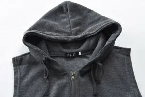 Close-up detail of men's dark grey hooded zip-up vest showing the neck label and zipper.
