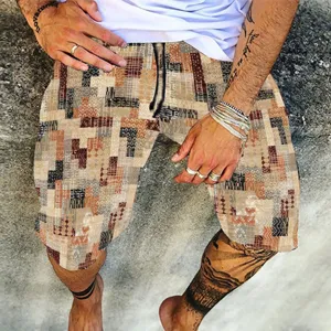 Men's casual geometric patchwork print summer beach shorts, comfortable streetwear design.