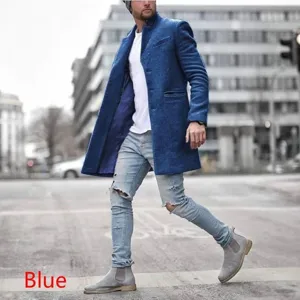 Detailed shot of a stylish men blue woolen overcoat worn in urban street scene outfit.