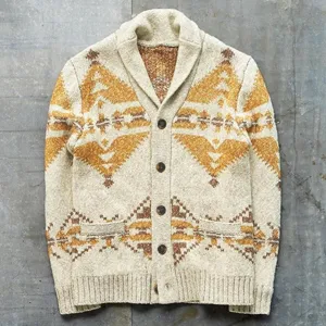 Close-up detail of mens vintage aztec geometric knit cardigan sweater with shawl collar and buttons.