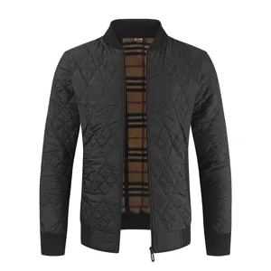 Men black quilted bomber jacket with plaid lining, warm fleece winter coat for men detail view.