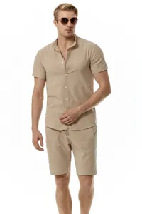 Detail view of casual linen short sleeve shirt and shorts set for men in khaki color.
