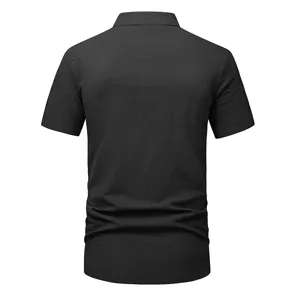 Detail view of solid black men short sleeve casual shirt, showing clean back design and smooth fabric.