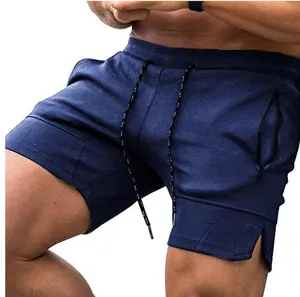 Men summer casual athletic shorts close-up view, dark blue drawstring pocket sportswear detail