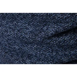 Close-up detail of dark blue heathered knitted fabric for men sweater texture display.