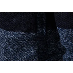 Men's knitted cardigan sweater fabric detail texture close-up view showing high quality material