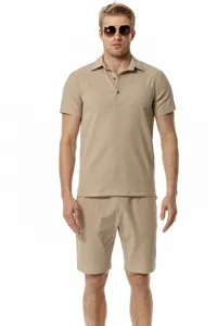 Detailed view of men's casual cotton linen polo shirt and shorts beach set in khaki.