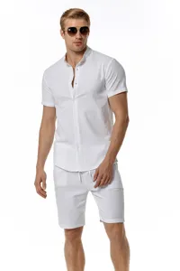 Details of the men's white linen short-sleeve shirt and matching summer beach shorts.