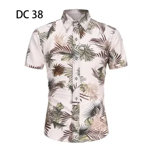 Detailed view of men's tropical palm leaf print short sleeve Hawaiian beach shirt.