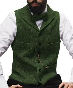 Detailed view of the green herringbone tweed vest, showcasing tailored fit and pocket chain.