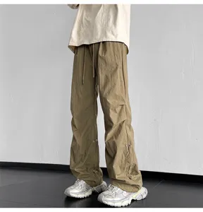 Cómodo pantalón paracaídas holgado baggy hombre mujer streetwear casual cordón beige