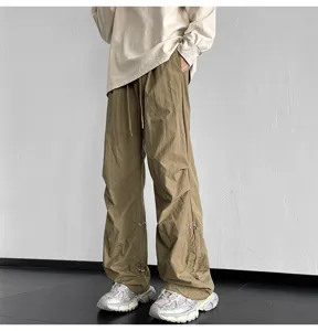 Pantalones cargo de paracaídas holgados informales para hombre con cordón ajustable.