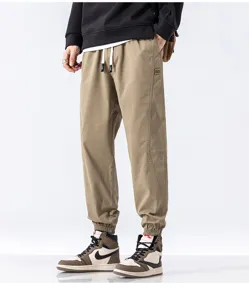 Men's khaki casual cargo sweatpants detail showcasing adjustable drawstring and elastic cuffs.