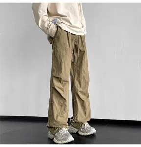 Pantalón paracaídas holgado y informal para hombre y mujer, streetwear con cordón ajustable.