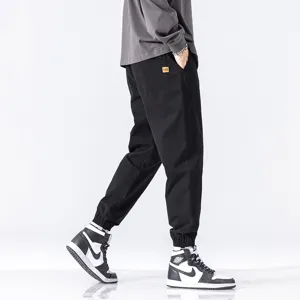 Men's casual cargo trousers, loose fit stylish jogger pants for autumn daily wear style.